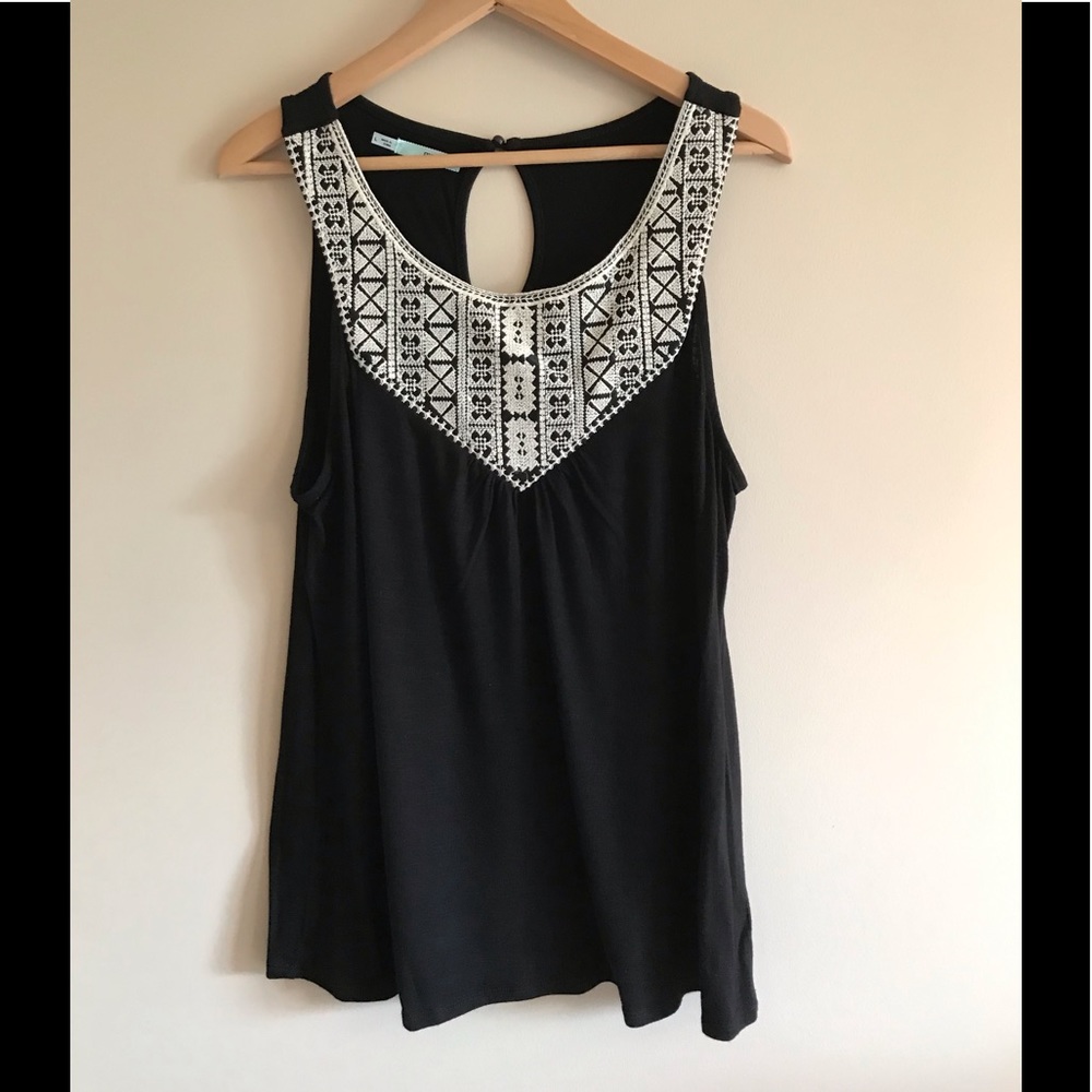 Maurice’s black rayon tank with embroidered detail size Large.